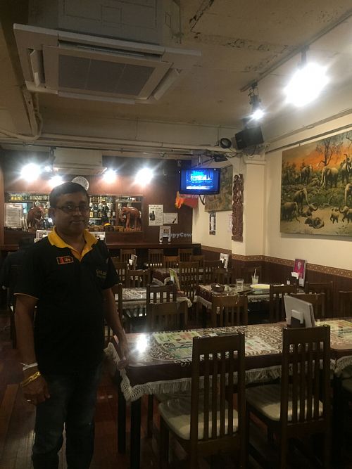 The owner and interior of the restaurant  at Sri Lanka in Kumamoto