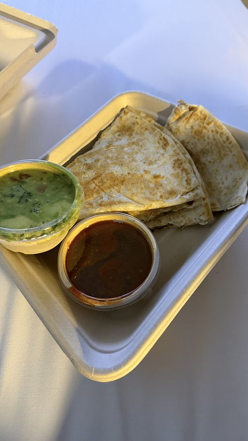 Vegan quesadillas with guac and mild salsa - not groundbreaking but good for a fast snackk  at Mad Mex in Albury