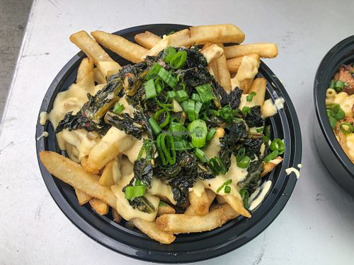 Cheese fries with kale at Mac n' Cheese Rebel in Los Angeles
