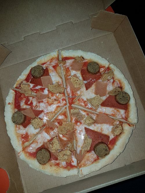 Meat feast. Pretty miserly toppings on this overly stodgy base. at Pizza in Liverpool