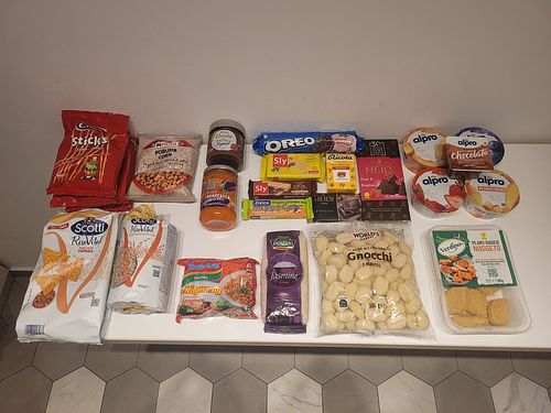 'Nacho' chips (lower left), roasted corn, gnocchi, chicken nuggets, Zacuscā, Alpro pudding/yoghurts, Heidi espresso chocolate: FANTASTIC. Cremlor choc hazelnut spread is average. at Mega Image - General Gheorghe Magheru in Bucharest