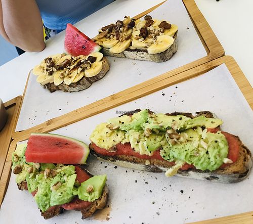 Tomato Avocado toast and banana dates toast 😋 at Parcería - Culto Al Cafè in Sevilla