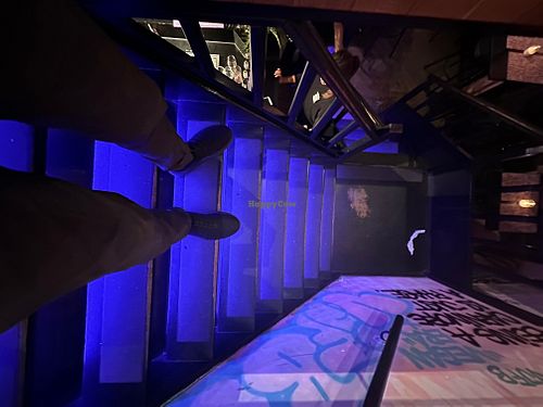 Remember watch your step down from bathrooms  at Vegan Junk Food Bar - Downtown in Amsterdam