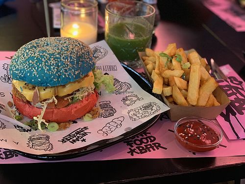 Chickn sandwich, fries, cold pressed juice with CBD oil at Vegan Junk Food Bar - Downtown in Amsterdam