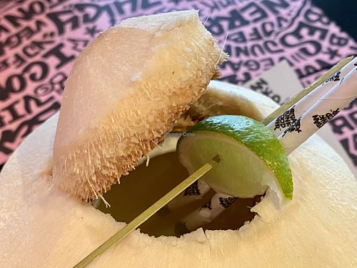 coconut juice 🥥 at Vegan Junk Food Bar - Downtown in Amsterdam