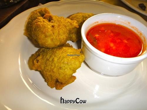 Vegan bada (lentil croquette) served with tomato sauce. Yum!  at Bibliothe in Rome