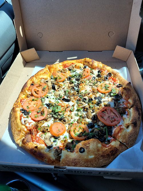 Roma Tomatoes, Tempeh, Olives, Mushrooms, Basil, Chives and Vegan Cheese  at Mellow Mushroom - temporarily closed in Bristol