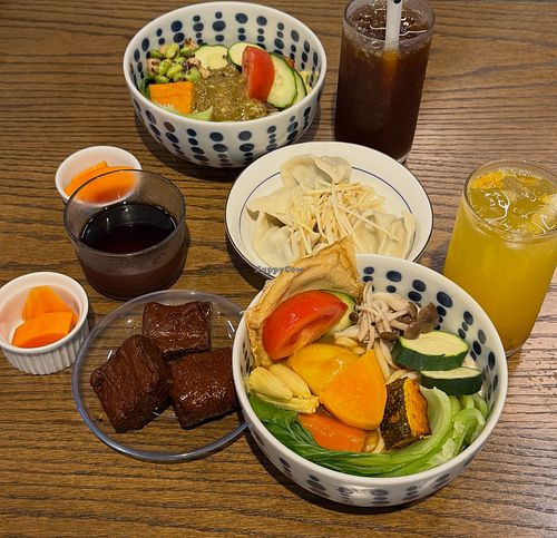 Vegan miso bibimap, braised tofu, dumplings and curry noodle dish with a vegan faux “egg”  at Rén Lǐ Jū 仁里居 - Yuli Your Home in Taipei