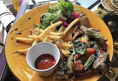 vegan pizza and shoestring fries with salad at Lemonwood Eatery in Okato