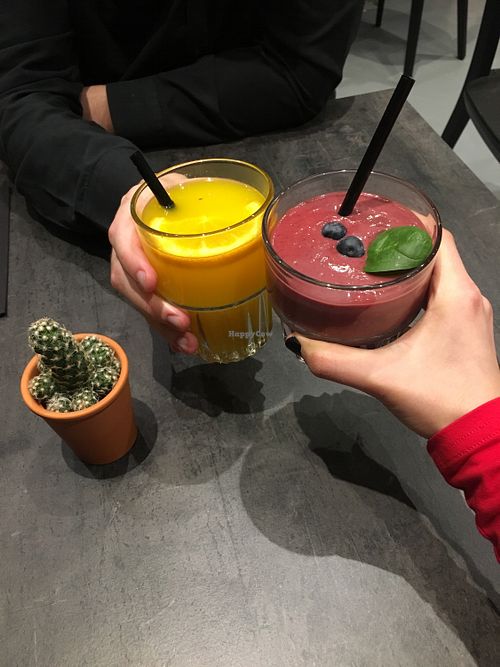 Fresh orange juice and avocado berry smoothie at The Avocado Show in Brussels