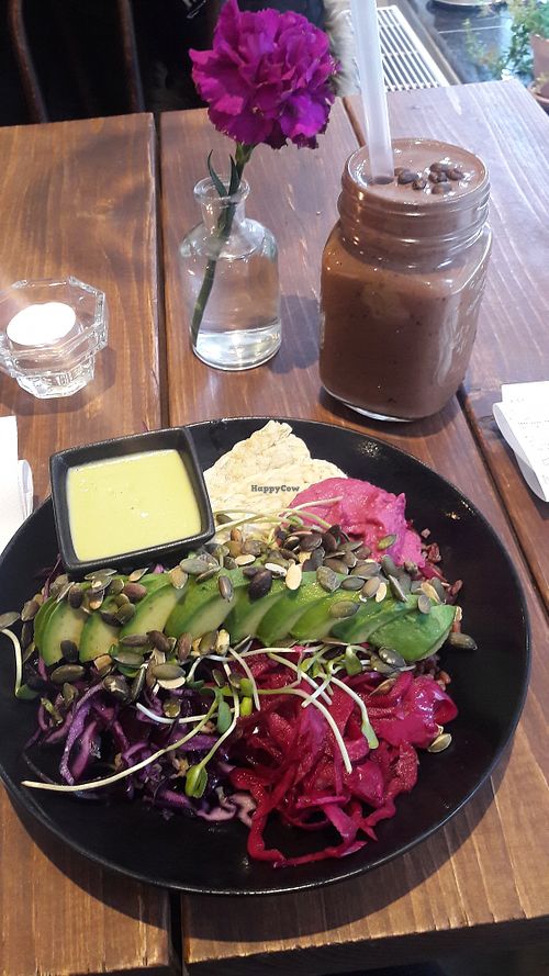Hummus Avocado bowl with marinated tempeh and a mocha espresso shake at A.VO.KA.DO in Malmo