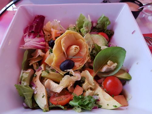 Salad- ask for dressing on the side or sans dressing at Ancora in Honfleur