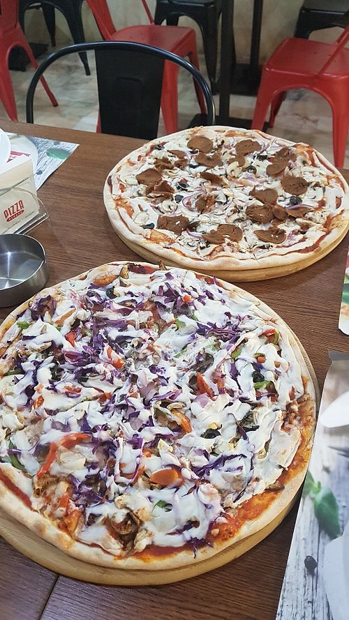 Two vegan pizzas at Pizza Please in Beirut