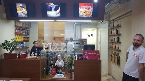 Inside at Pizza Please in Beirut