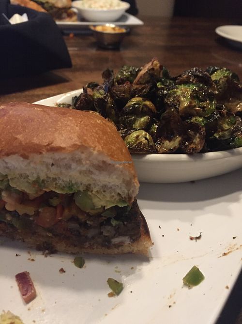 Black bean burger with a side of sprouts! at Truago in Trenton