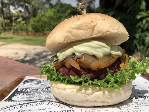 Bean (lentil, beetroot, walnut, sun-dried tomato) burger with caramelised onion and avocado sauce at Cooper's Specialty Kitchen in Ao Nang