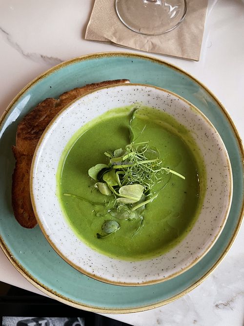 Pea and mint soup with toasted sourdough bread at Twelve Eatery in Bournemouth