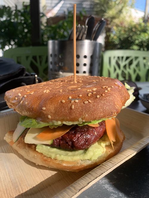 Sweets and beets burger with a sweet potato, beetroot and lentil homemade Pattie.   at Cafe Invigor8 in Yandina