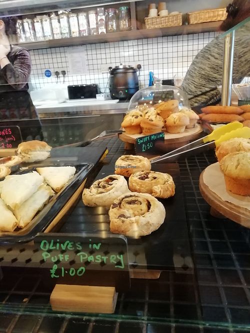 Vegan items are written in green pen at Brick and Olive in North London
