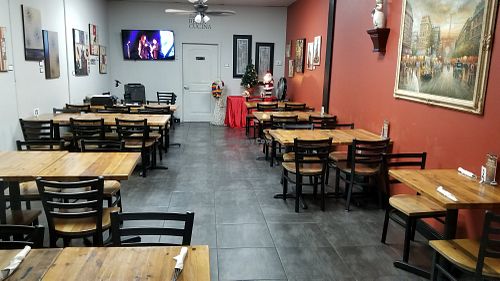 The back room is bigger than the front room at The Meatball Stoppe in Orlando