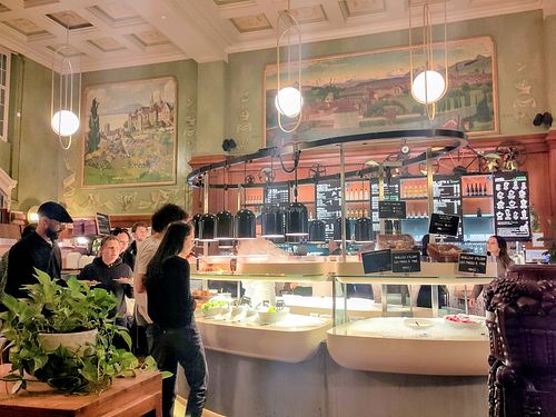 Food buffet + interior at Tibits in Lausanne