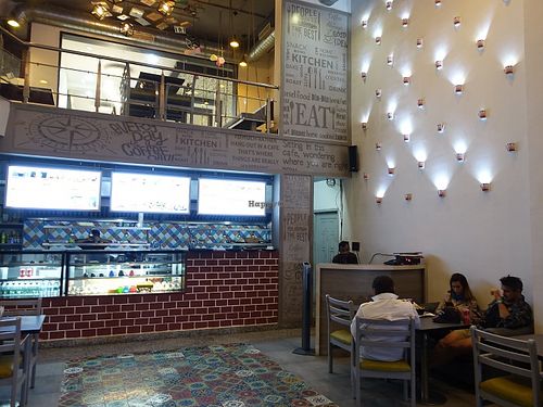 Restaurant interior on the ground floor at Nirvana The Veg Cafe in Bodhgaya