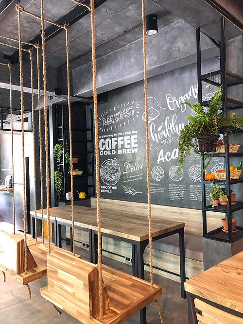 Loft style interior and swing seats at Fruit Fusion in Phuket