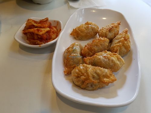 Fried dumplings and kimchi at Maru JaYeonSik Kimbap in Seoul