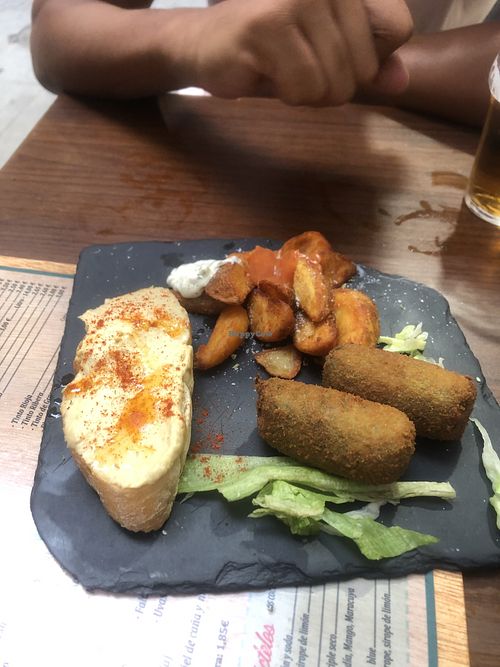 Hummus tosta and spinach croquetas   at La Buena Vida in Granada