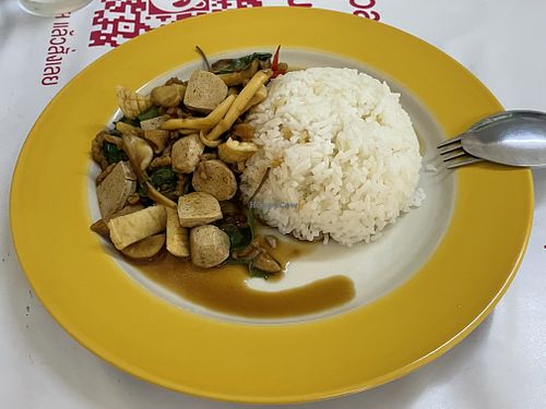 Fried basil with vegan pork sausage, squid and salted fish.  at Raan J Koh in Loei