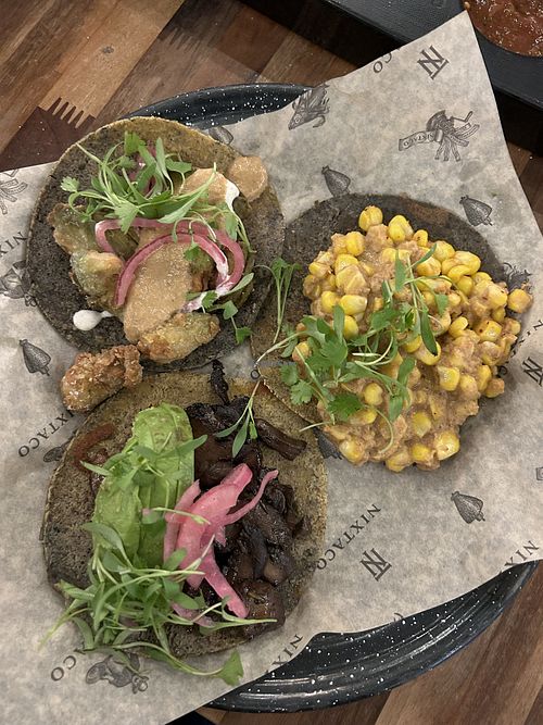 Avocado explosion, mushroom, and corn tacos.   at Nixtaco in Roseville