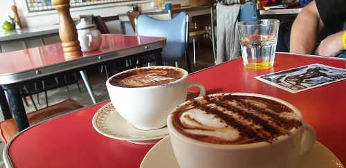 Almond milk (closer to the camera) and soy cappuccino at Feedback Cafe in Yarraville