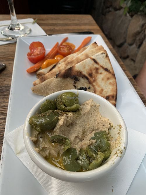 Pita bread and hummus plate  at Forge in the Forest in Carmel-by-the-sea