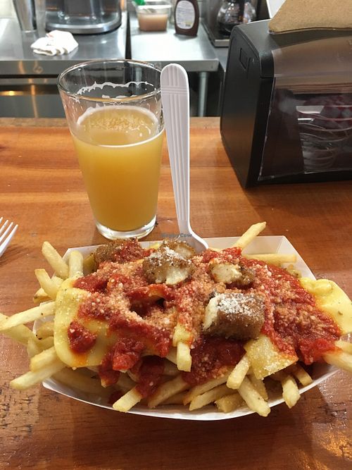Pizza fries! (and beer from upstairs) at Munchies Vegan Diner in Santa Ana