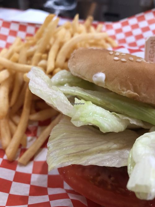 Cheeseburger Royale with fries at Munchies Vegan Diner in Santa Ana