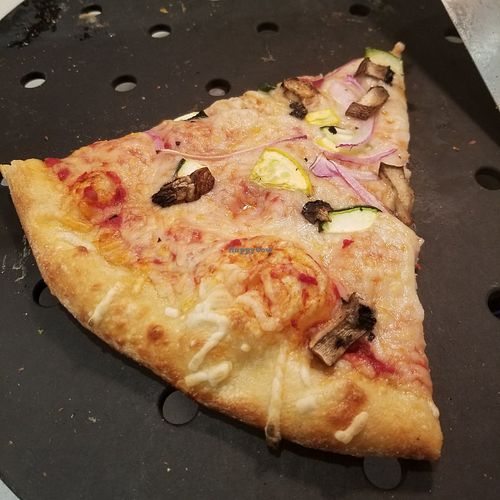 Cold slice of pizza that was sitting too long at Whole Foods Market in Sedona