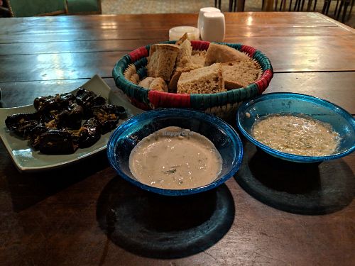 Stuffed eggplant, dips and bread at Sofra in Luxor