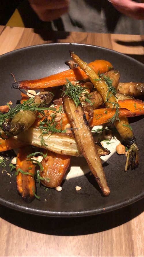 Roast carrots, lemon verbena creama and toasted hazelnuts  at SACRO in Buenos Aires