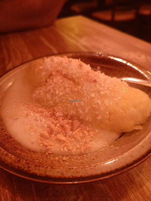 Fried mango wrapped with rice on coconut cream at Quan Xanh in Leipzig