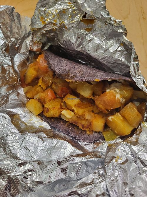 Papas Rancheras on Blue Corn Tortilla at Revolucion Coffee & Juice in San Antonio