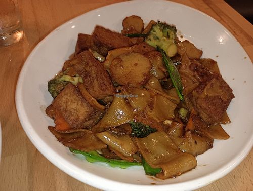 Hunan stir fries chow fun noodles with tofu at GingeRootz Asian Grille in Appleton