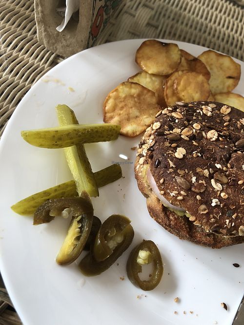 Burger and ‘chips’ at Travel Yoga Cafe in New Delhi
