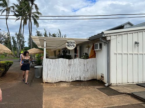 The restaurant is tucked back around the left from the main driveway at Raised by the Waves  in Kahuku