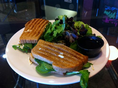 vegan chicken spinach & artichoke panini.  dip it in the balsamic vinegar from your side salad for extra flavour! at Red Velvet Cafe - Sahara in Las Vegas