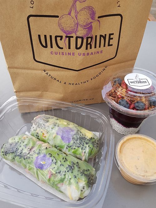 Takeout of avocado crunch spring rolls with peanut dip, and chia pudding at Victorine in Luxembourg City