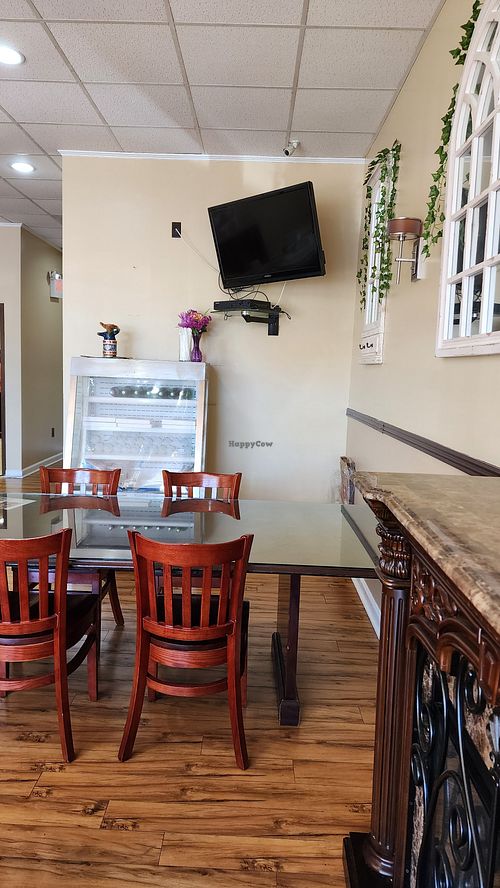 Two tables at Vegan Community Kitchen in Apex