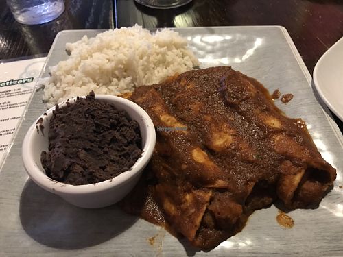 Enchiladas Rojas con papas at Catrina's  in Edwardsville