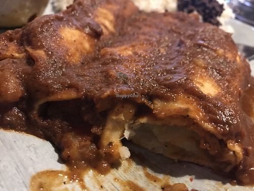 Enchiladas Rojas con papas at Catrina's  in Edwardsville