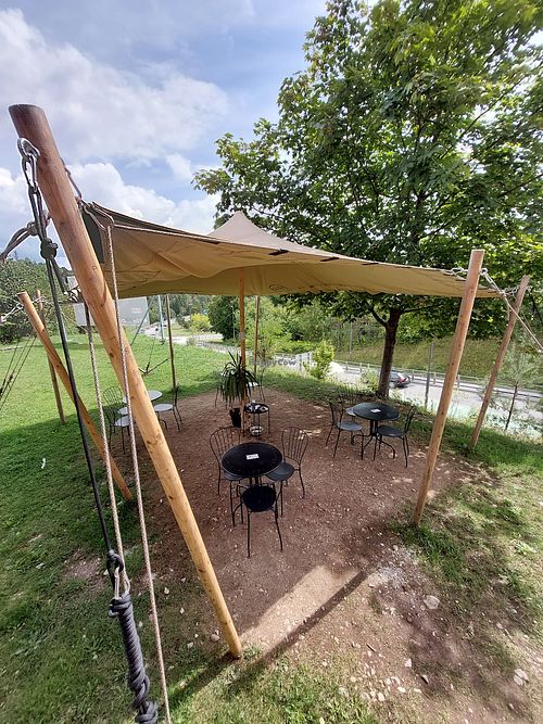 Outside seating area at Tavci Kuhna in Lesce