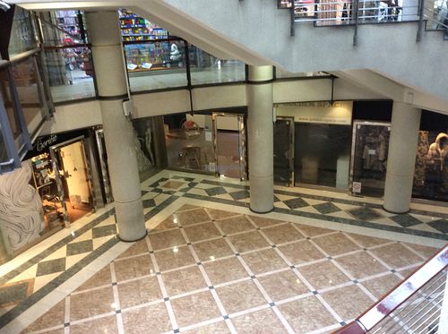The front door looking down from the ground floor of the millennium centre at Zdrawo Slatko in Belgrade
